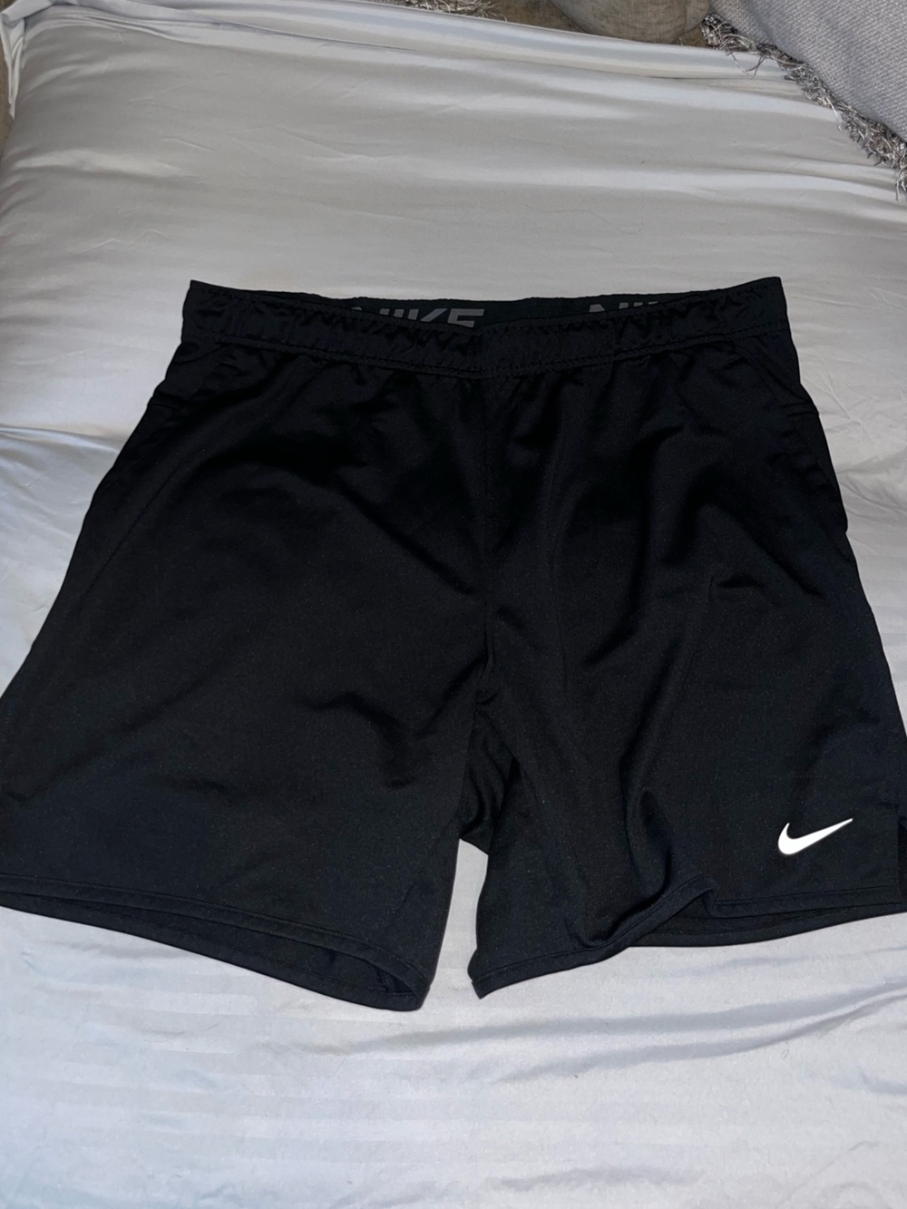 Nike Black Athletic Shorts with White Logo Accent